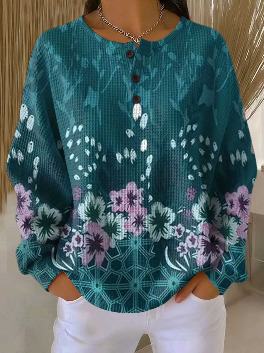 Pull Nora avec élégant motif floral pour un style chic et tendance